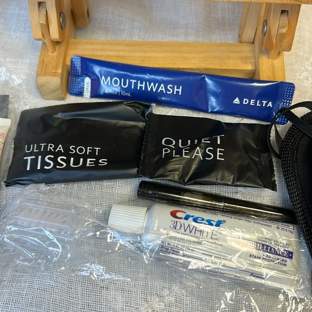Tumi NWT cosmetic travel bag filled with goodies all new in packages